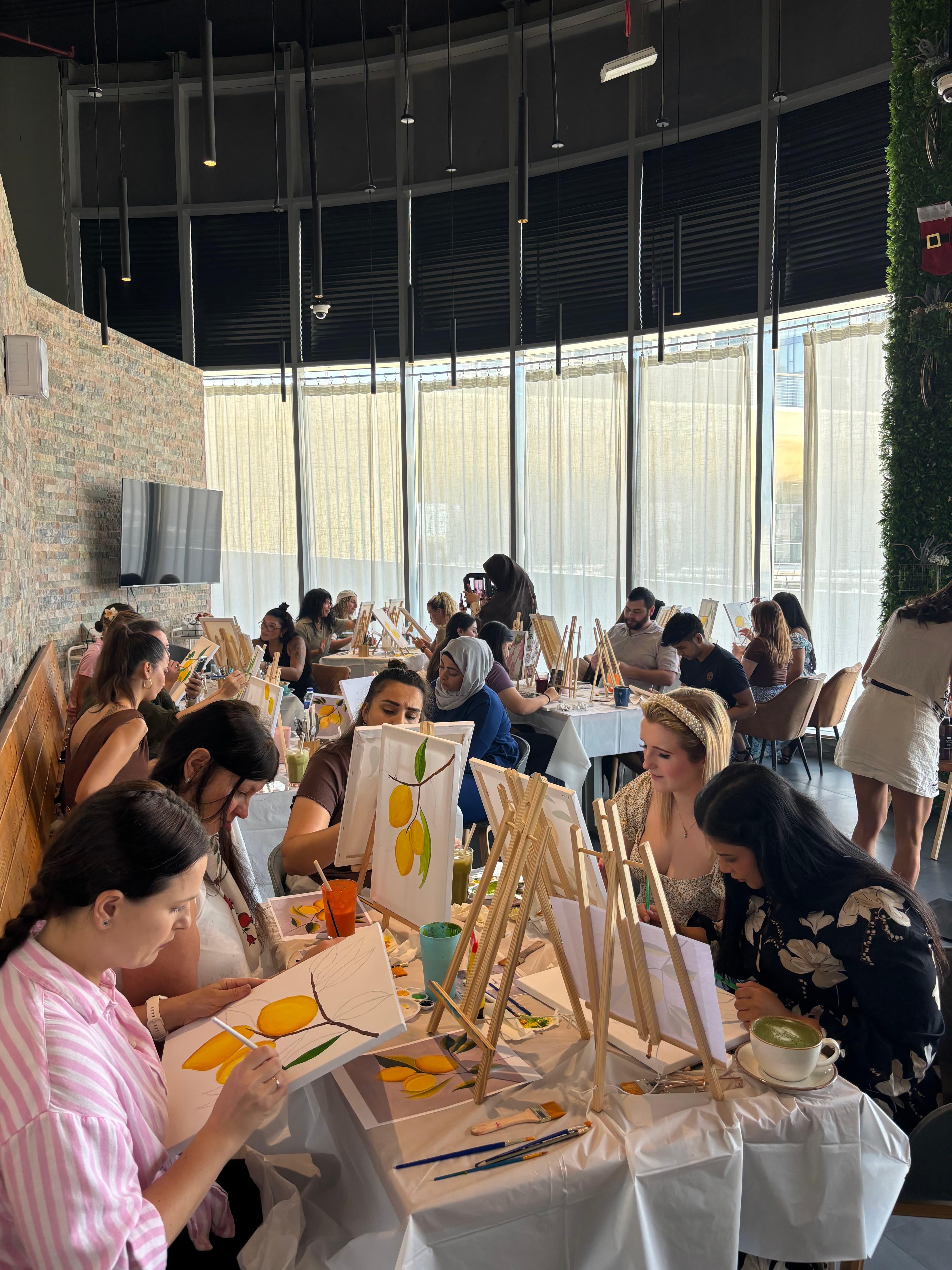 Large group lemon painting session